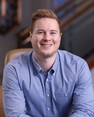 portrait of a smiling person in professional attire